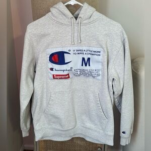 Champion Supreme Gray Hoodie with Logo Patches